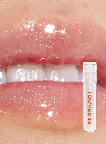 TOWER 28 BEAUTY.  ShineOn Lip Jelly Non-Sticky Gloss.  |  Magic - clear with gold shimmer.